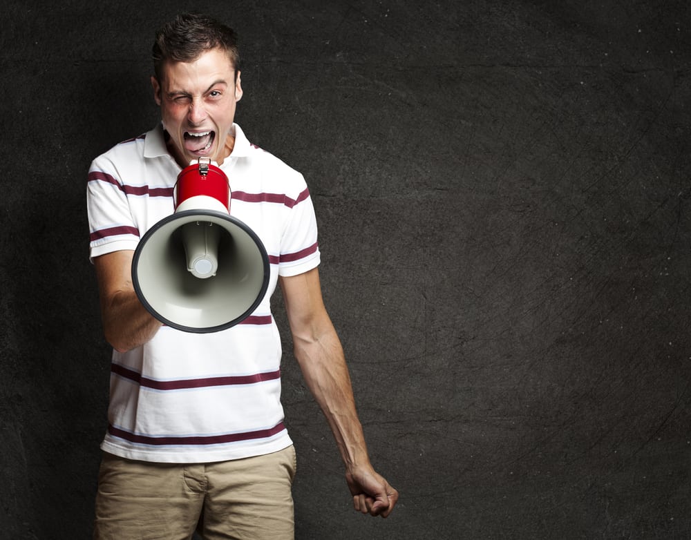 Man shouting with megaphone